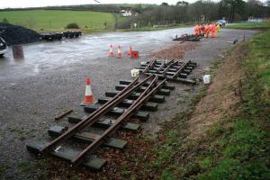 Partially dismantled turnouts laid out in the car park ready for regauging