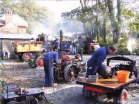 Miniature engines being tended to behind the platform