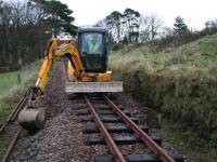Pulling the ballast shoulder in following slewing