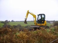 The mini digger on ballast duty