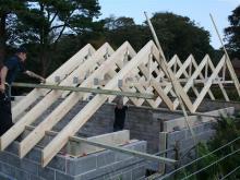 The roof trusses go into place