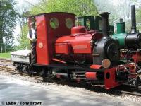 Statfold having just coupled to its train. Fireman Bill poses on the footplate as Sid passes in the background